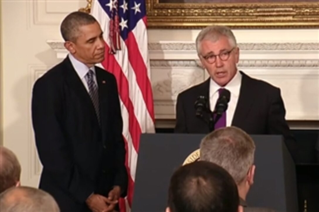 Defense Secretary Chuck Hagel discusses his resignation during a news conference with President Barack Obama at the White House in Washington, D.C., Nov. 24, 2014. Hagel will continue to serve as defense secretary until a successor is confirmed by the U.S. Senate.