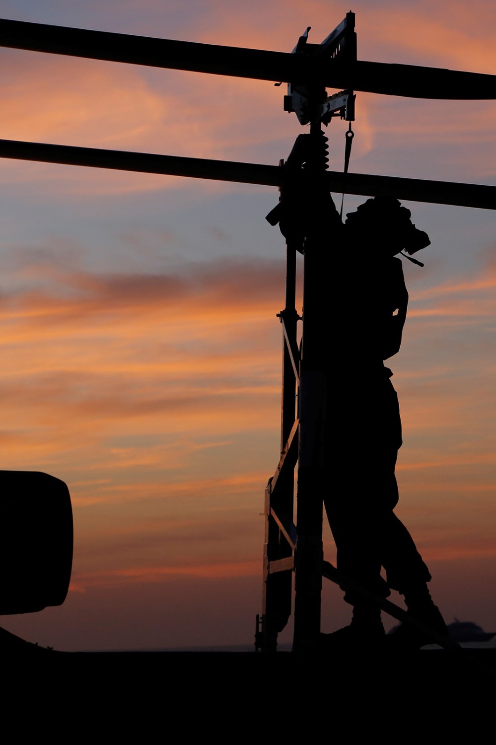 A U.S. Marine with Marine Medium Tiltrotor Squadron 163 (Reinforced), 11th Marine Expeditionary Unit (MEU), secures the blades of an AH-1Z Super Cobra after flight quarters on the flight deck of amphibious transport dock ship USS San Diego (LPD 22), Nov. 20. The 11th MEU is a forward-deployed, flexible sea-based Marine Air-Ground Task Force embarked with the San Diego as part of the Makin Island Amphibious Ready Group in the U.S. 5th Fleet area of responsibility. (U.S. Marine Corps photos by Gunnery Sgt. Rome M. Lazarus/Released) 