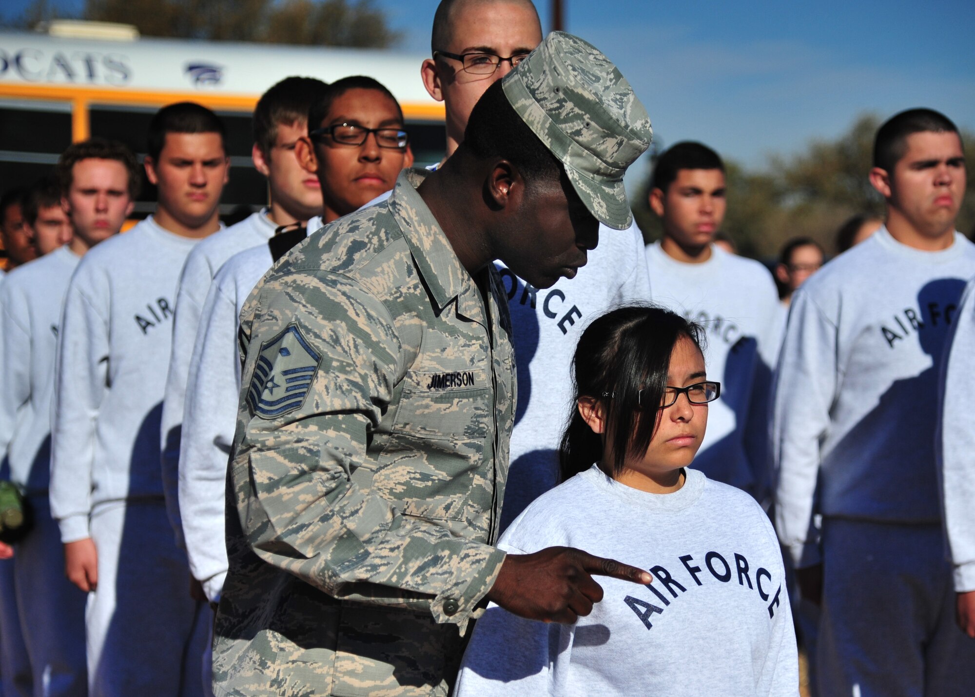 U.S. Air Force Master Sgt. Marvin Jimerson, 27th Special Operations Maintenance Squadron first sergeant and former basic military training technical instructor, questions a cadet during drill Nov. 21, 2014 at Cannon Air Force Base, N.M. Junior Reserve Officer Training Corps cadets with Clovis, New Mexico high school were provided military insight by an elite core of Air Commandos as part of a partnership effort with Cannon’s local community. (U.S. Air Force photo/Staff Sgt. Alexxis Mercer)

