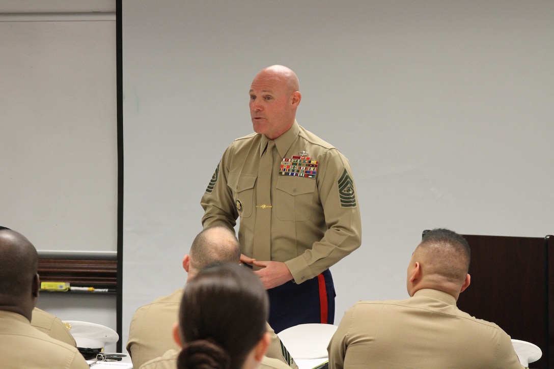 U.S. Marine Corps Sgt. Maj. Michael Barrett, the Sergeant Major of the Marine Corps, speaks to the Marines of Recruiting Station Richmond during a visit to their headquarters in Richmond, Virginia, Nov. 21, 2014. Barrett visited the RS to pass on knowledge and boost the morale of the Marines. (U.S. Marine Corps photo by Cpl. Aaron Diamant/Released)
