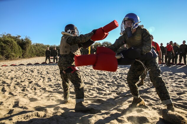 Recruits of Charlie Company, 1st Recruit Training Battalion, face off during a pugil stick bout at Marine Corps Recruit Depot San Diego, Nov. 5. During the course of recruit training, Charlie Company will step into the ring three more times. Each time the difficulty level will increase.