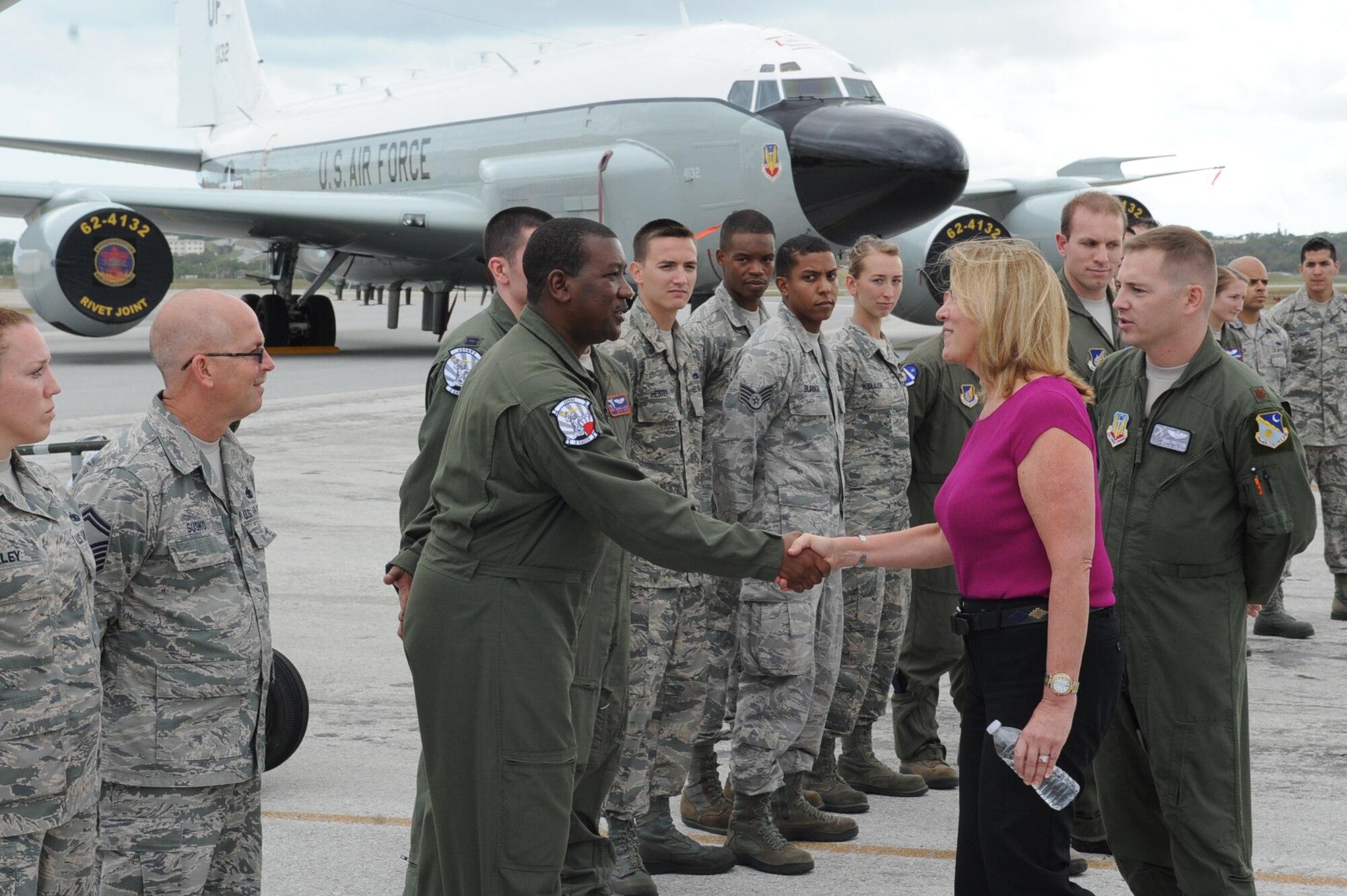 Secretary of the Air Force Deborah Lee James greets members of the 5th Expeditionary Airborne Command and Control Squadron, 961st Air Combat Control Squadron and 82nd Reconnaissance Squadron during her visit to Kadena Air Base, Okinawa, Japan, Nov. 25, 2014. James met and discussed Air Force policies and goals with Airmen during her visit to Kadena and received a firsthand look at the base's critical role in the Pacific mission, "fight tonight, win tomorrow." (U.S. Air Force photo by Airman 1st Class Zackary A. Henry/Released)