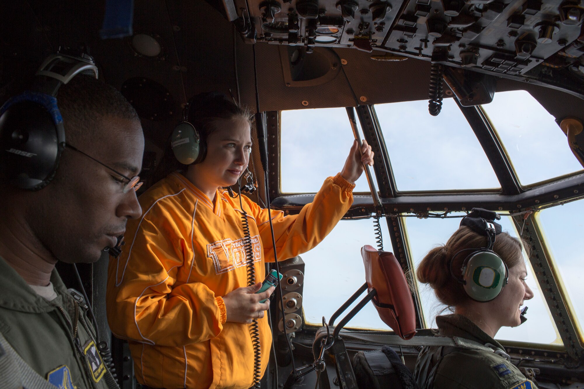 Megan Rivera, wife of Senior Airman Christopher Rivera, 374th Aircraft Maintenance Squadron, tours the cockpit area of a C-130 Hercules during Operation VOLANT SPOUSE 14’ over Mt. Fuji, Japan, Nov. 24, 2014. The 374 OG hosted an orientation flight to show their appreciation for their spouses. (U.S. Air Force photo by Osakabe Yasuo/Released)