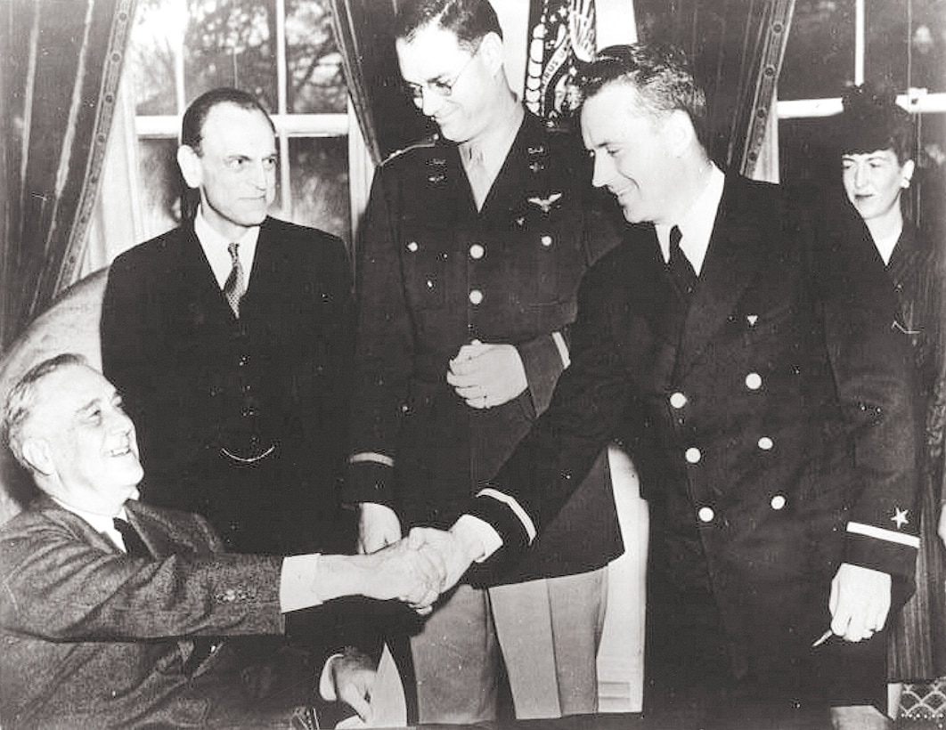 President Franklin D. Roosevelt presents the nation’s first-ever Air Medals, given for valor in flight, to a pair of CAP subchasers – Maj. Hugh R. Sharp, center, and 1st Lt. Edmund “Eddie” Edwards, second from right, in the Oval Office in February 1943. The two were recognized for their heroic rescue July 21, 1942, of a fellow CAP member, 1st Lt. Henry Cross, whose plane had crashed in the Atlantic 20 miles off the coast of Delaware. Looking on is James M. Landis, wartime chief of the Office of Civilian Defense. By the end of World War II, CAP members had received 824 Air Medals. (Courtesy Photo)