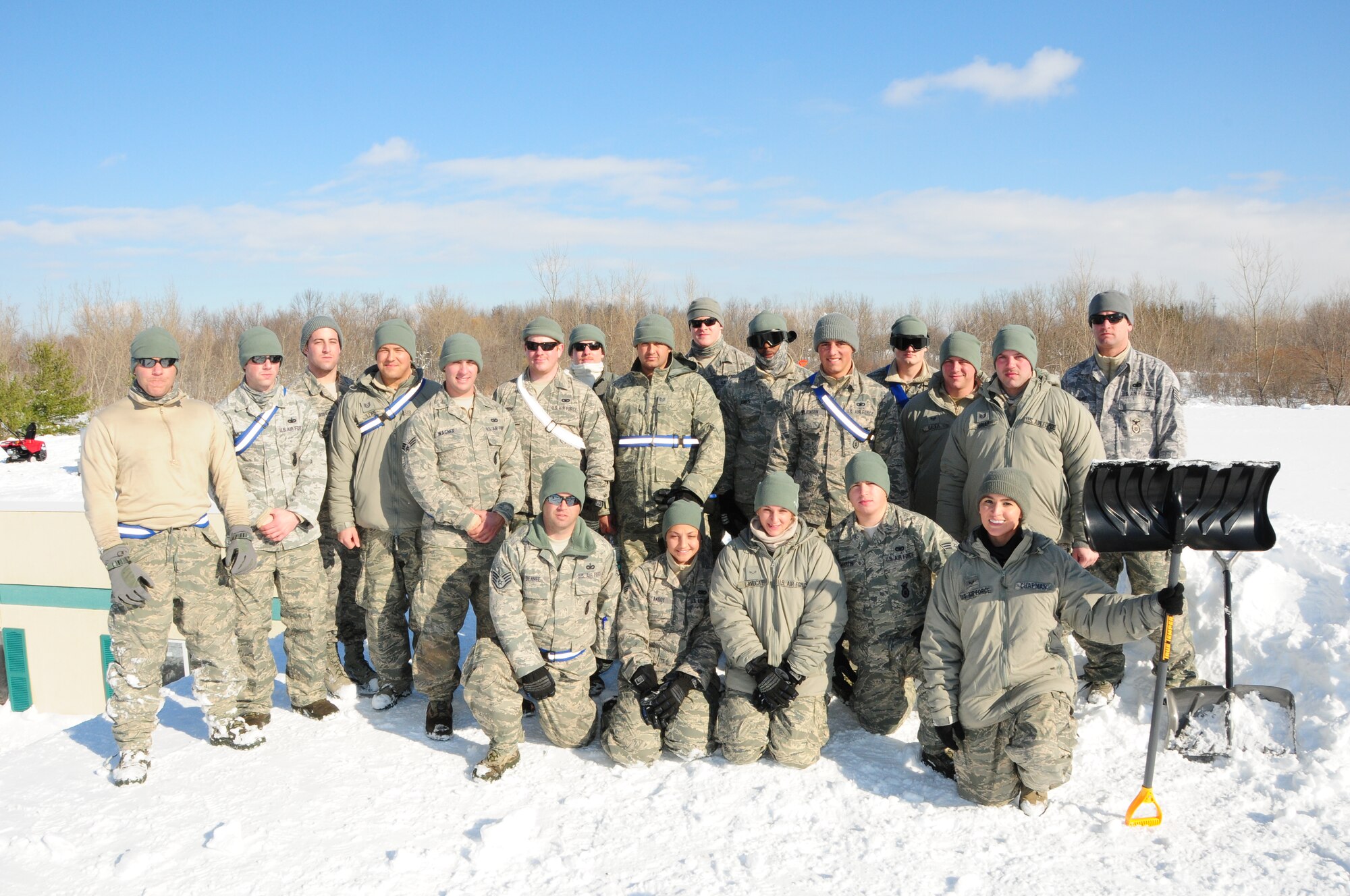 Airmen from the 107th Airlift Wing’s Security Forces take a break from removing four feet of snow from the roof of Eden Heights Assisted Living Facility in West Seneca, New York which came from the snow storm that hit the Western New York area on Nov 18, 2014. (U.S. Air National Guard photo by Senior Master Sgt. Ray Lloyd)