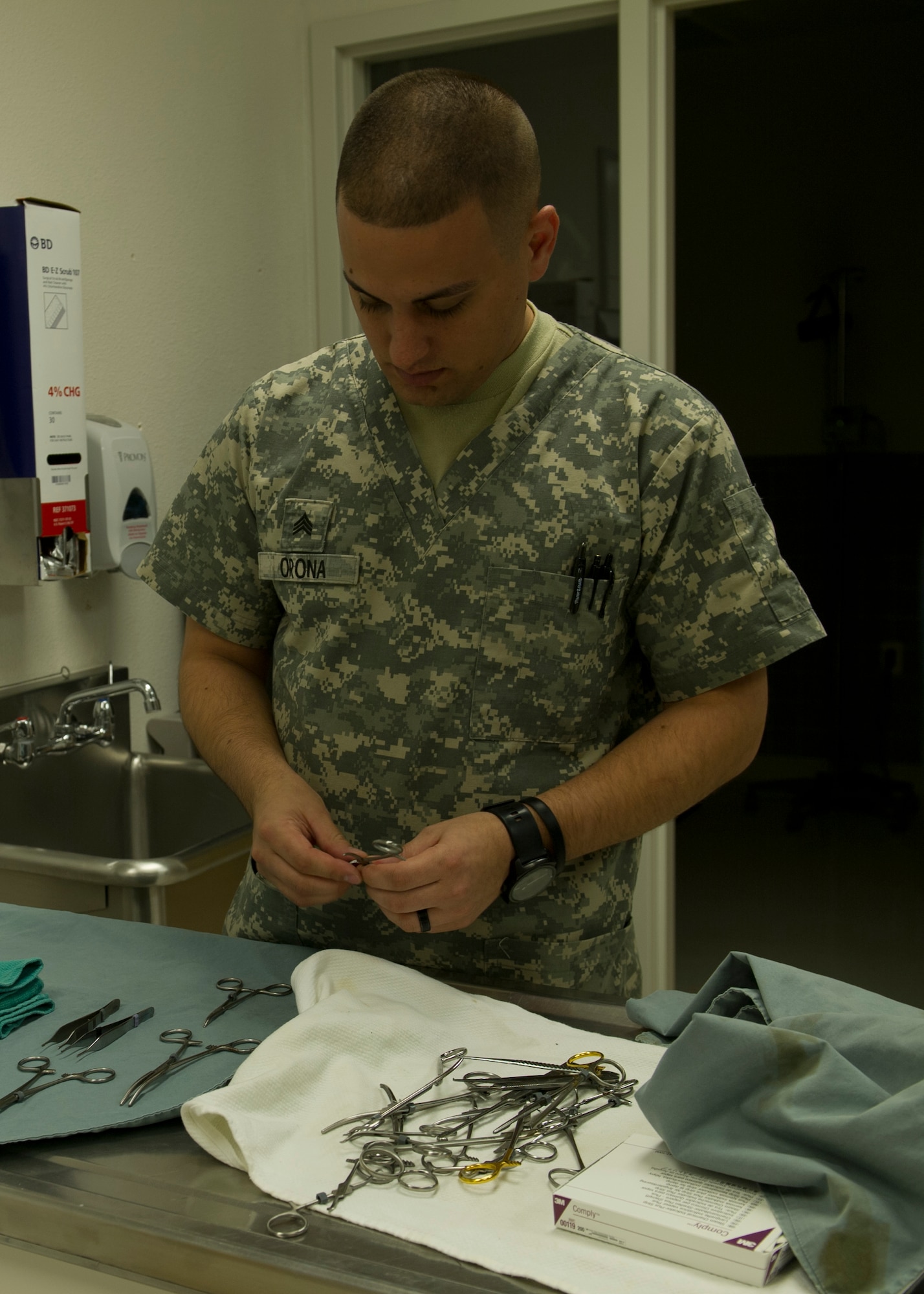 Army Sergeant Wayne Orona, veterinarian clinic noncommissioned officer in charge, Public Health Command prepares surgical equipment at Holloman Air Force Base, N.M., Nov. 19. The Holloman Veterinary Clinic provides care to the pets of active duty and retired military, along with the German Air Force personnel on Holloman. The clinic provides numerous services such as dental work vaccinations, x-rays, and small surgical procedures as well as all care to Military Working Dogs stationed at Holloman.  (U.S. Air Force photo by Senior Airman Leah Ferrante/released)