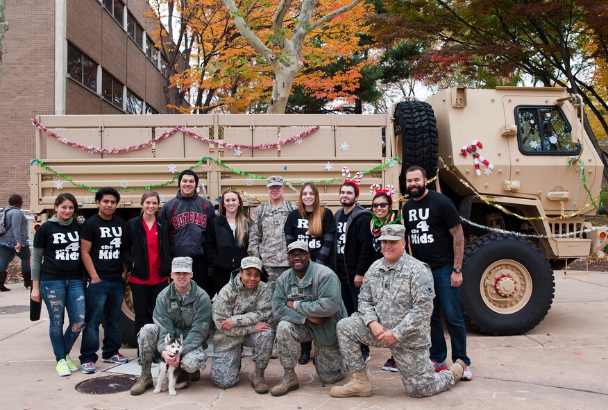 Members of the 42nd Combat Communications Squadron from Joint Base McGuire-Dix-Lakehurst, N.J., volunteer students at Rutgers University, Camden Campus and members of the Joint Training and Training Development Center at JBMDL, collected toys and donations Nov. 13 for less fortunate children and families within the local communities. (U.S. Air Fore photo/Christian Deluca)