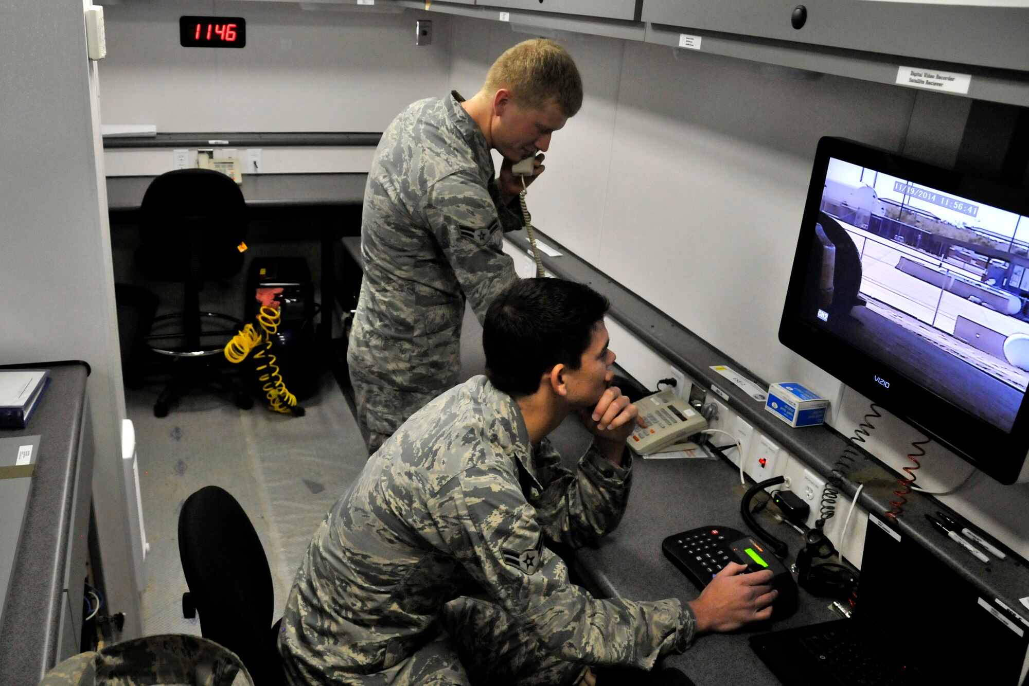 GOODFELLOW AIR FORCE BASE, Texas – Airman 1st Class Jared B. Lunstad and Airman 1st Class Matthew D. Glenn, 17th Civil Engineer Squadron emergency management journeymen, perform function checks on the Mobile Emergency Operation Center Nov. 19. It is important for the MEOC to be fully functional to be used at a moment’s notice. (U.S. Air Force photo/ Airman 1st Class Scott Jackson)
