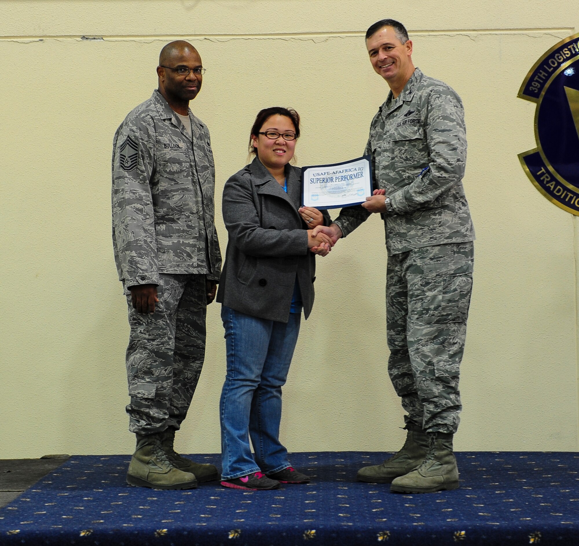 Ms. Sabrina Sena, 39th Force Support Squadron Community Center recreation assistant, was recognized as a superior performer at the Unit Effectiveness Inspection out brief Nov. 24, 2014, Incirlik Air Base, Turkey. Sena won for her outstanding individual performances during the UEI and was one of four individuals recognized during the event. (U.S. Air Force photo by Airman Cory W. Bush/Released)