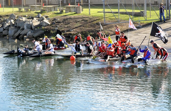 Participants prepare to launch their makeshift boats during the Amphibious Vehicle Test Branch’s inaugural bathtub boat race Nov. 21 at Camp Pendleton, Calif. Seven teams assigned to the AVTB, a subordinate unit of Marine Corps Systems Command, were challenged to build boats out of scavenged and recycled materials. 