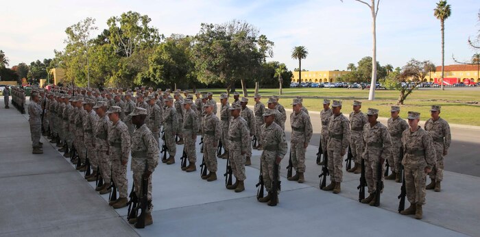 Recruits of Golf Company, 2nd Recruit Training Battalion, stand at parade rest as they mentally prepare for the Series Commander Inspection at Marine Corps Recruit Depot San Diego, Nov. 17. It was crucial for the recruits to remain calm, keep their eyes forward while at the position of attention and answer the questions they were asked. It was a sign of confidence and bearing - two traits drill instructors were looking for in recruits.
