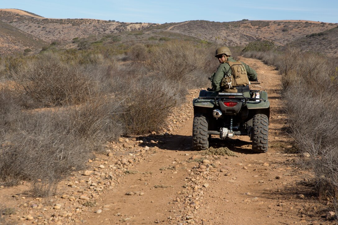 Staff Sgt. Darryl Cuenca, Special Reaction Team commander with Marine Corps Air Station Miramar Provost Marshal’s Office, leads the way during a routine patrol for trespassers aboard eastern portion of Miramar, Nov. 24. Trespassing aboard the installation’s property could result in anything from a verbal or written warning to hefty fines and, in extreme cases, serious injury.