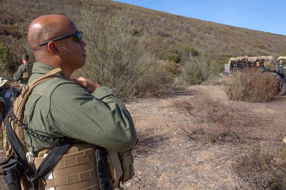 Staff Sgt. Darryl Cuenca, Special Reaction Team commander with Marine Corps Air Station Miramar Provost Marshal’s Office, watches the horizon and trails for trespassers aboard eastern portion of Miramar, Nov. 24. Encroachment continues to be an issue that Miramar officials and military police take very seriously for a number of reasons.