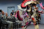 Hassan Bridgeway, with the Red Crooked Sky Dance Troupe, performs a version of the fancy dance during observances of National Native American Heritage Month at the Army National Guard Readiness Center in Arlington, Va., Thursday, Nov. 20, 2014. During the event a number of traditional and contemporary Native American dances were demonstrated and the significance of each dance was discussed. 