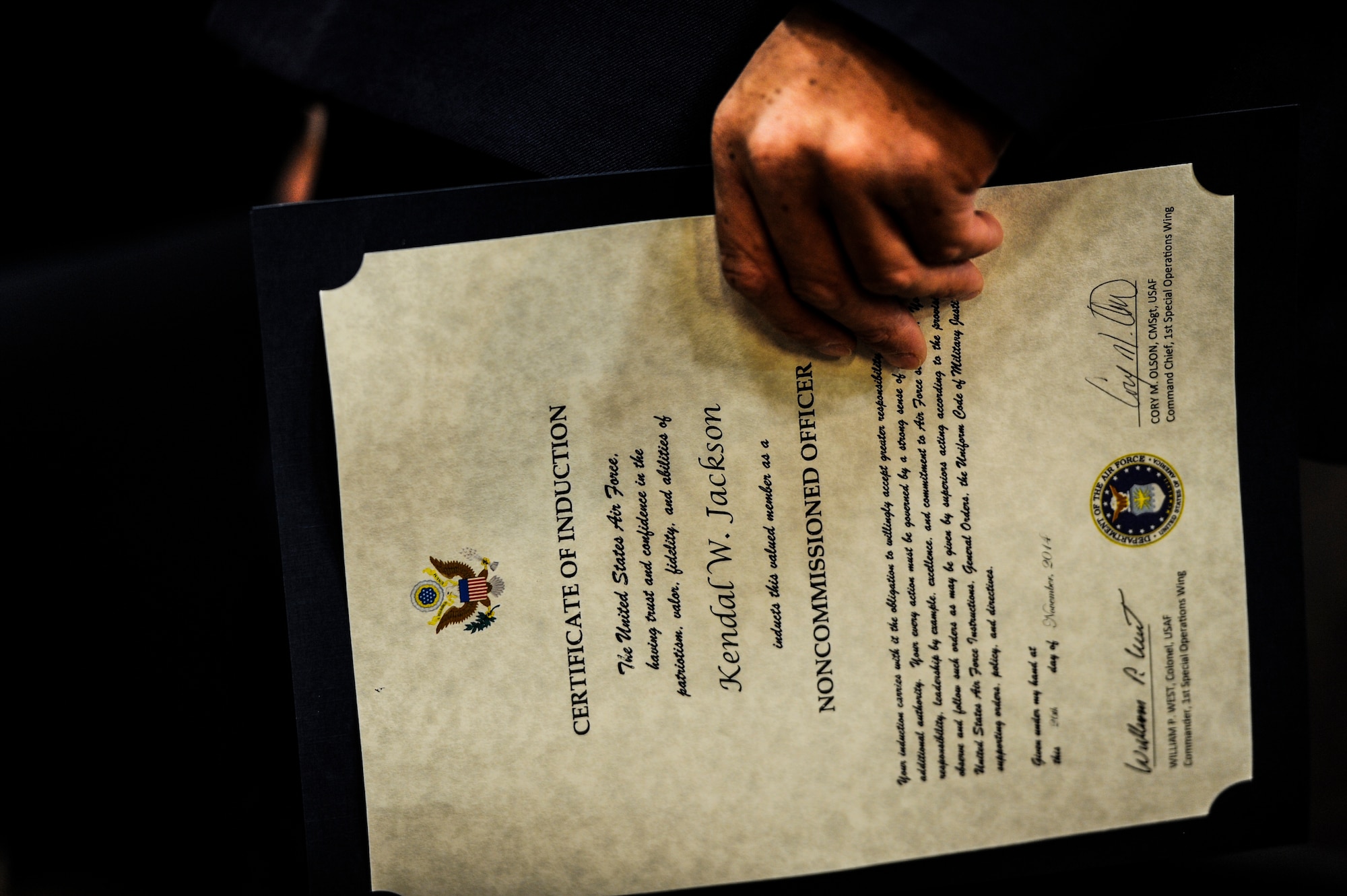 Hurlburt Field’s newest NCOs received a Certificate of Induction, during a ceremony at Hurlburt Field, Fla., Nov. 26, 2014. An NCO-Induction ceremony is a time-honored tradition of welcoming the newest military leaders. (U.S. Air Force photo/Senior Airman Christopher Callaway)