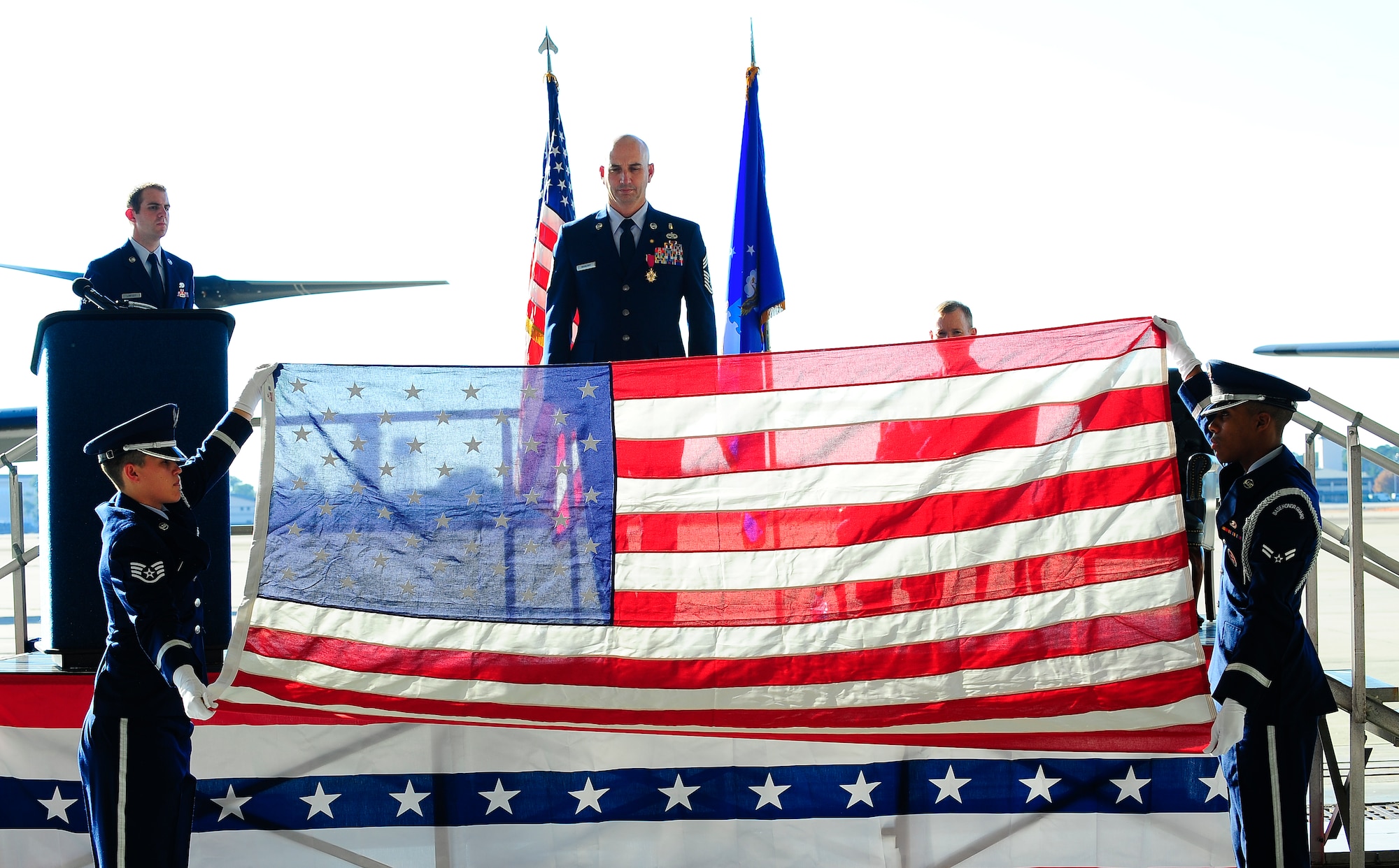 Hurlburt Field honor guard folds a retirement flag, during Chief Master Sgt. Jeff Maberry’s retirement ceremony at Hurlburt Field Fla., Nov. 21, 2014. Chief Maberry was the 1st Special Operations Wing command chief and retired after 26 years in the Air Force. (U.S. Air Force photo/AIrman 1st Class Andrea Posey)