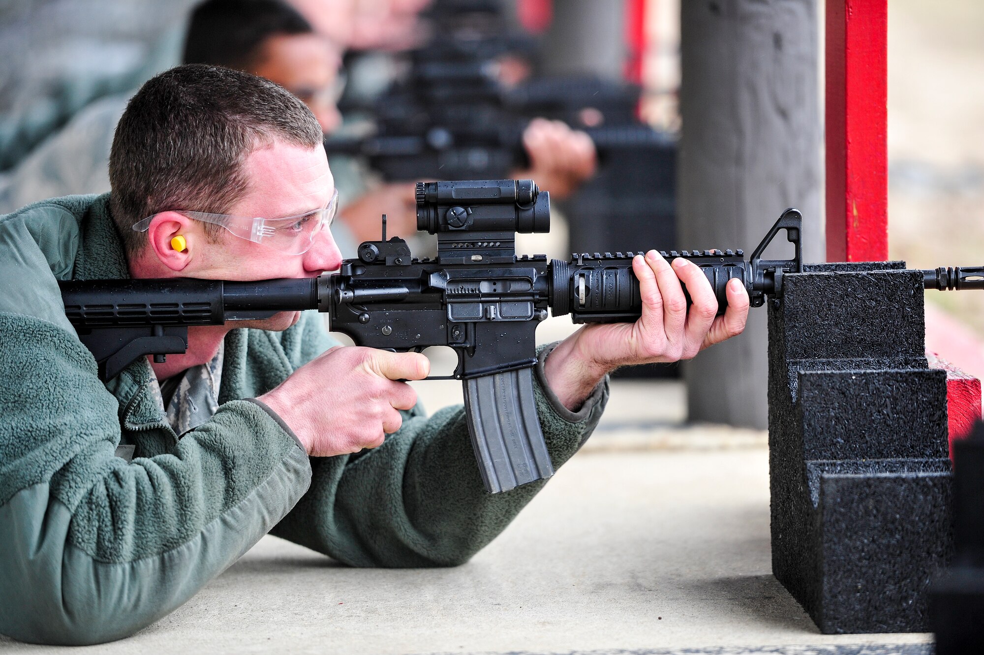 Staff Sgt. Tim Zidrashko, 1st Special Operations Equipment Maintenance Squadron aerospace ground equipment combat craftsman, fires his M4 rifle during small arms training at Hurlburt Field, Fla., Nov. 13, 2014. Combat Arms Training and Maintenance instructors train and qualify Airmen on required weapons needed for deployments. (U.S. Air Force photo/Airman 1st Class Jeff Parkinson)