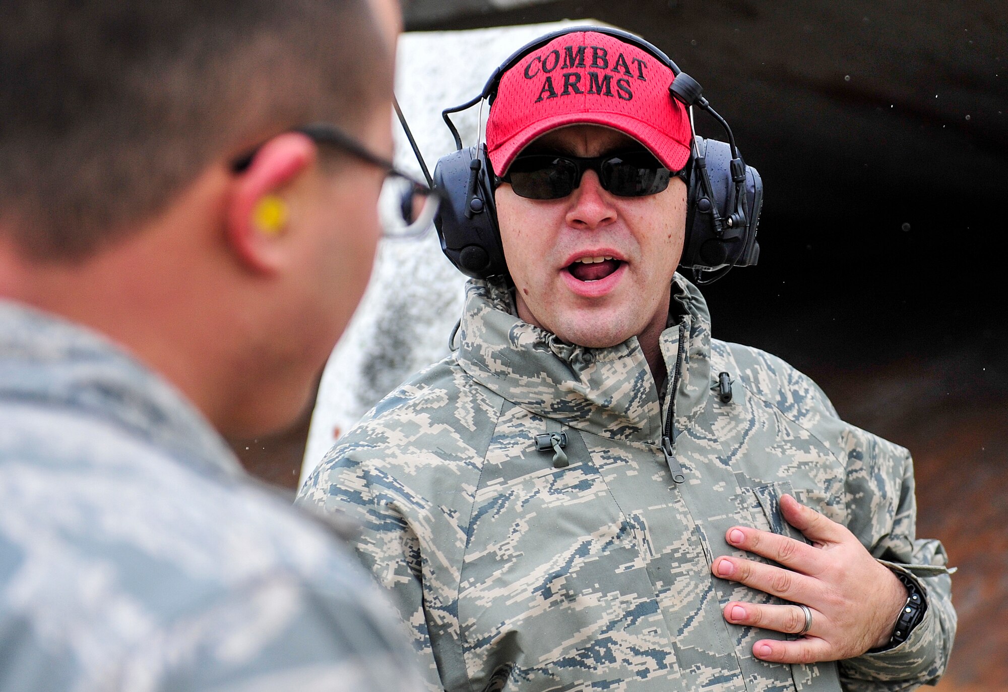 Staff Sgt. Casey Paine, 1st Special Operations Security Forces Squadron Combat Arms Training and Maintenance instructor, gives sight adjustment advice for the M4 rifle during small arms training at Hurlburt Field, Fla., Nov. 13, 2014. CATM instructors train and qualify Airmen on required weapons needed for deployments. (U.S. Air Force photo/Airman 1st Class Jeff Parkinson)
