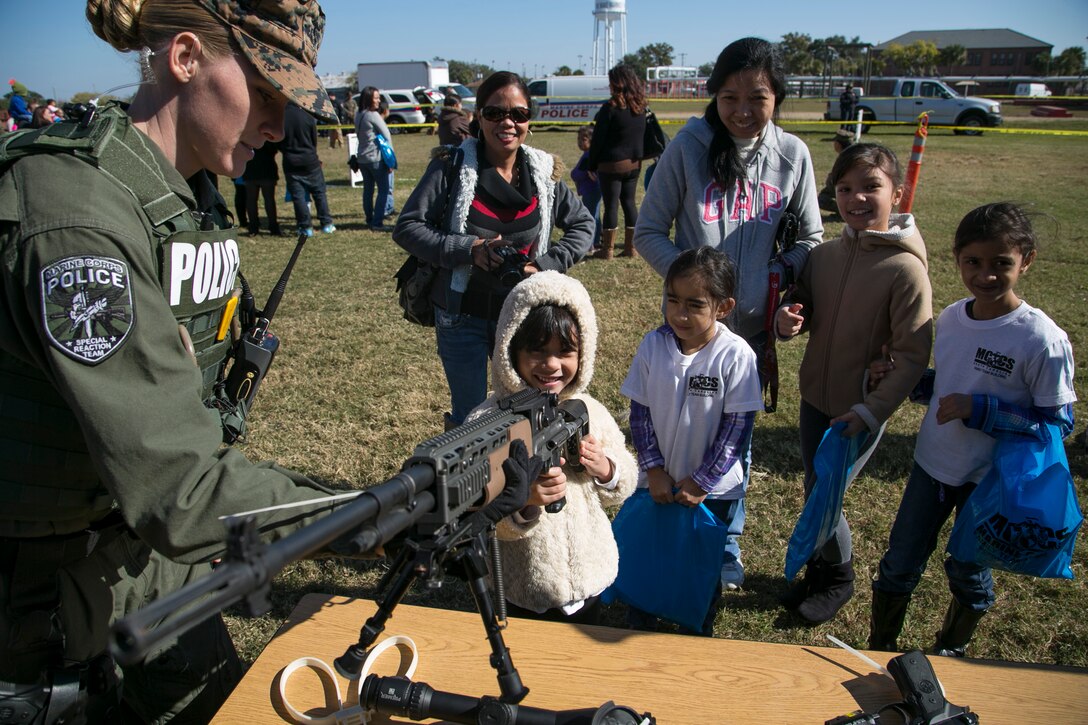 Tri-Command children celebrated the Marine Corps’ 239th anniversary during the Children’s Marine Corps Birthday Ball Celebration at the All-Weather Training Facility aboard Marine Corps Recruit Depot Parris Island, Nov. 15. Unlike other Marine Corps Balls, this one allows Marines to celebrate and share the occasion with their children. During the event, Marines and their families eat, play games, and conduct ceremonial traditions such as the oldest and youngest cake cutting with the children.  
