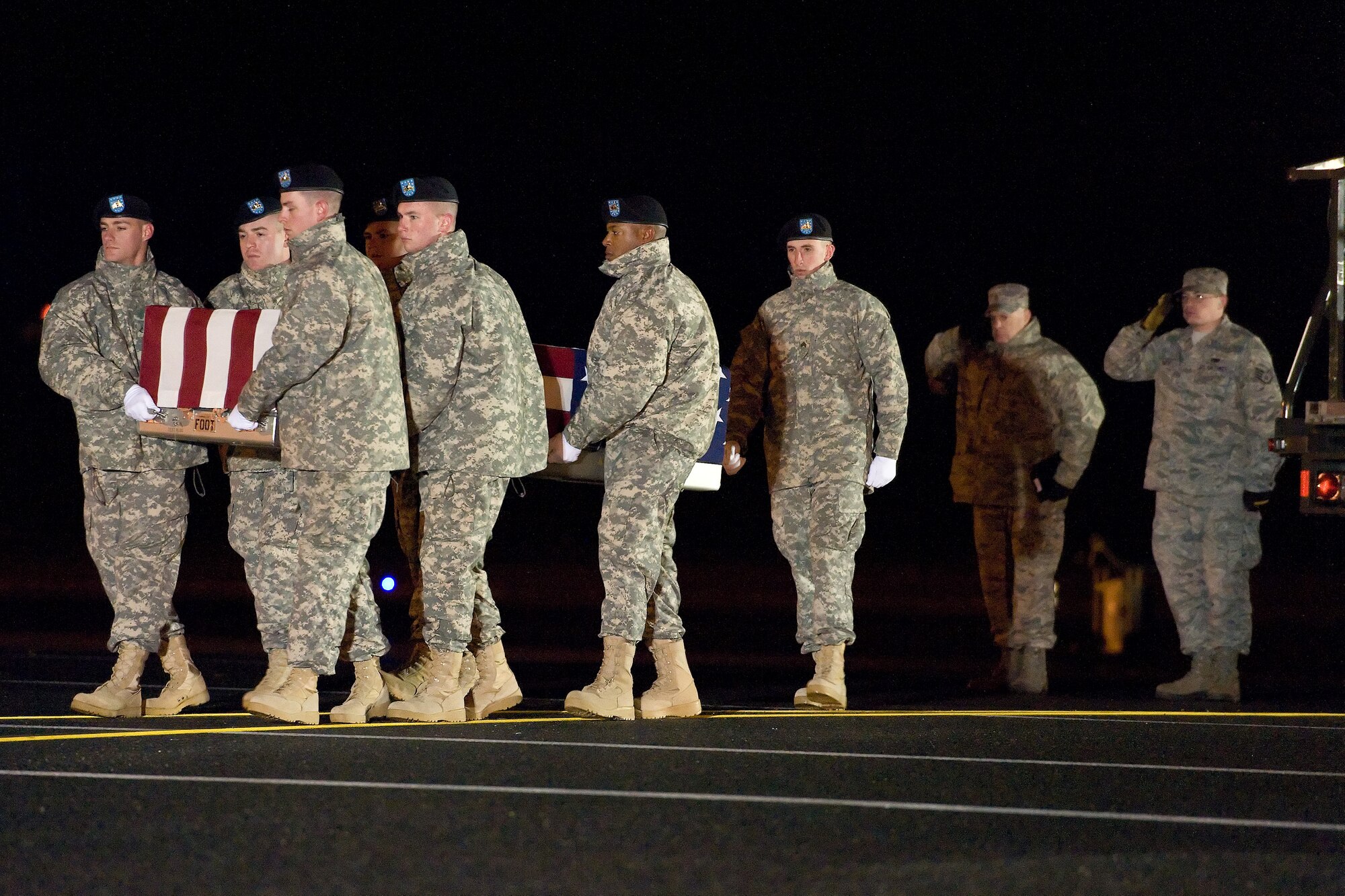 A U.S. Army carry team transfers the remains of Army Sgt. Maj. Wardell B.Turner of Nanticoke, Md., Nov. 26, 2014, at Dover Air Force Base, Del. Turner was assigned to Headquarters, United States Army Garrison, Fort Drum, N.Y. (U.S. Air Force photo/Roland Balik)