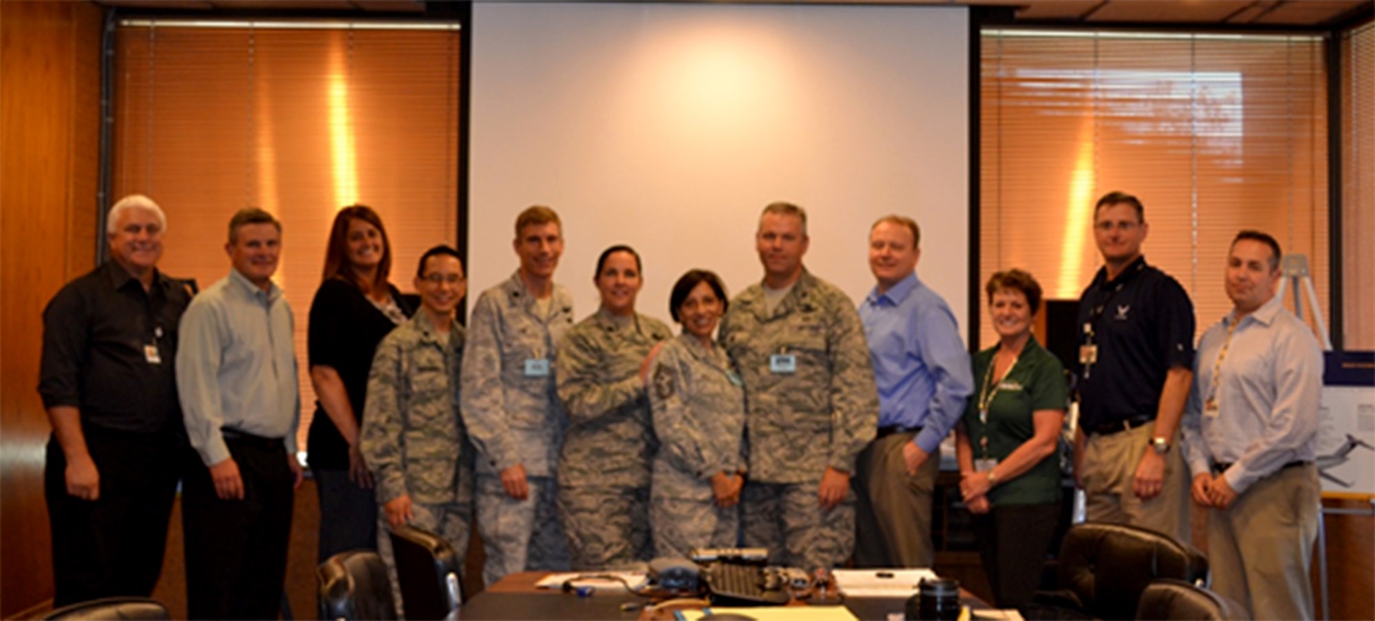 TRAVIS AIR FORCE BASE, Calif. -- Left to Right:  Judd Hubbard, Brian Hook, Sharon Bobowski, Lt. Col. Guevara, Lt. Col. Link, Lt. Col. Soares, Command Chief Master Sergeant Kelly, Col. Williams, Barney Clark, Jennifer Bezek, Russ Wooten, Tyson  Burnett.  (Courtesy photo) 