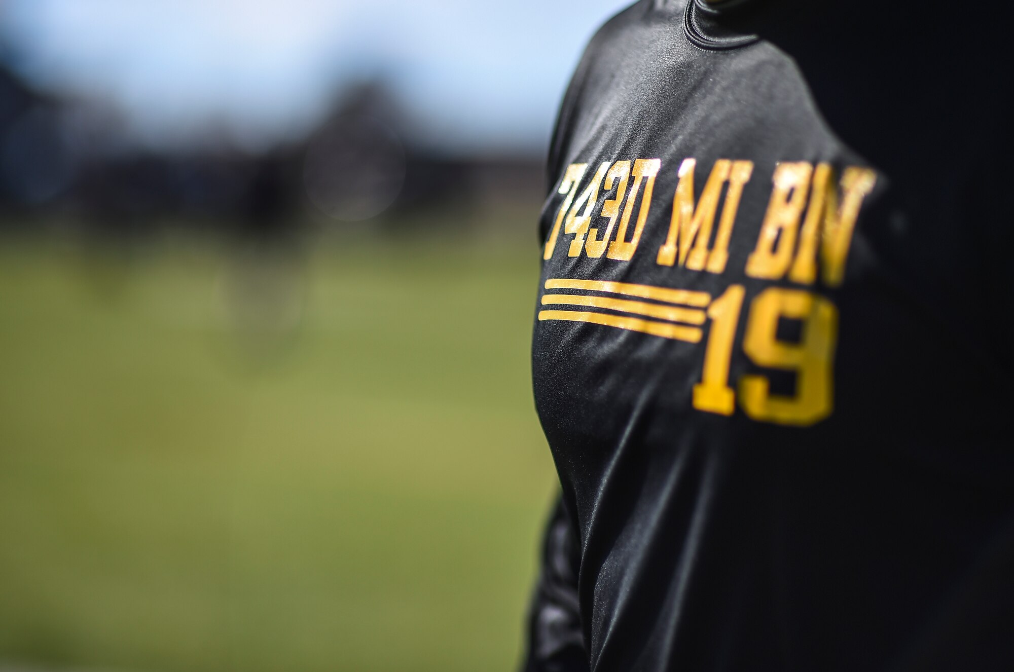 A 743rd Military Intelligence Battalion Soldier readies himself at the line of scrimmage during the battalion’s 2nd Annual Turkey Bowl football game Nov. 26, 2014 at the multipurpose field on Buckley Air Force Base, Colo. The officers challenged the NCOs during their pre-Thanksgiving game. (U.S. Air Force photo by Senior Airman Riley Johnson/Released)