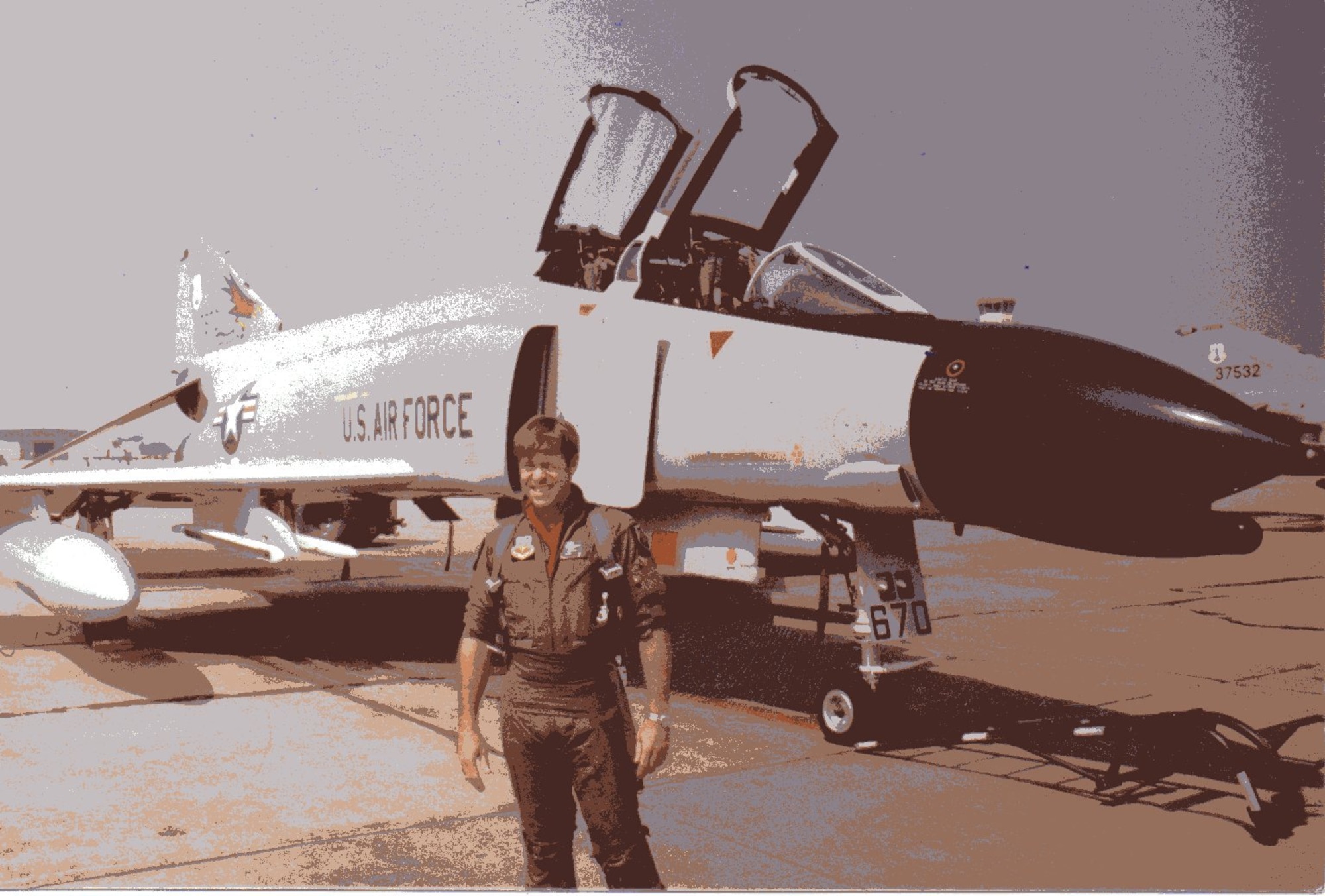 Maj. Ronald M. Moore, 123rd FIS pilot, smiles for the camera in the Florida sunshine by Oregon F-4C-21-MC 63-7670 at William Tell 1984.  He was the Top Gun pilot in the F-4 category and third overall in the meet.  Note Oregon F-4C-19-MC 63-7532 at immediate right.  Aircraft 670 ended up at Taegu AB, Korea as a battle damage repair ship, whilst 532 is preserved at Barksdale AFB, LA.  (142FW/HO Archives)