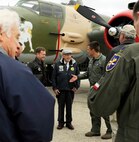 Lt. Col. Robert Bryant III (right), 559th Flying Training Squadron commander, greets retired Lt. Col. Richard Cole (center), former Doolittle Raider, Nov. 14 at Joint Base San Antonio-Randolph. At left is Lt. Col. Jeremy Seals, 559th FTS director of operations. For the complete story of Cole's visit, see page 6.
(U.S. Air Force photo by Johnny Saldivar )
