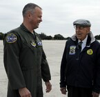 Col. Brian Bowman (left), 340th Flying Training Group commander, greets retired Lt. Col. Richard Cole Nov. 14 on the Joint Base San Antonio-Randolph flight line. Cole is one of four living Doolittle Raiders and the copilot of the original B-25 “Yellow Rose.”
(U.S. Air Force photo by Desiree Palacios)
