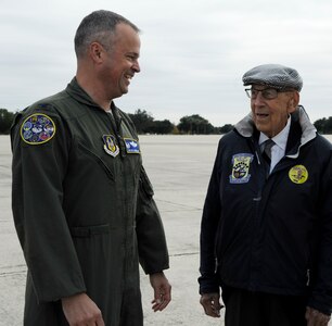 Col. Brian Bowman (left), 340th Flying Training Group commander, greets retired Lt. Col. Richard Cole Nov. 14 on the Joint Base San Antonio-Randolph flight line. Cole is one of four living Doolittle Raiders and the copilot of the original B-25 “Yellow Rose.”
(U.S. Air Force photo by Desiree Palacios)

