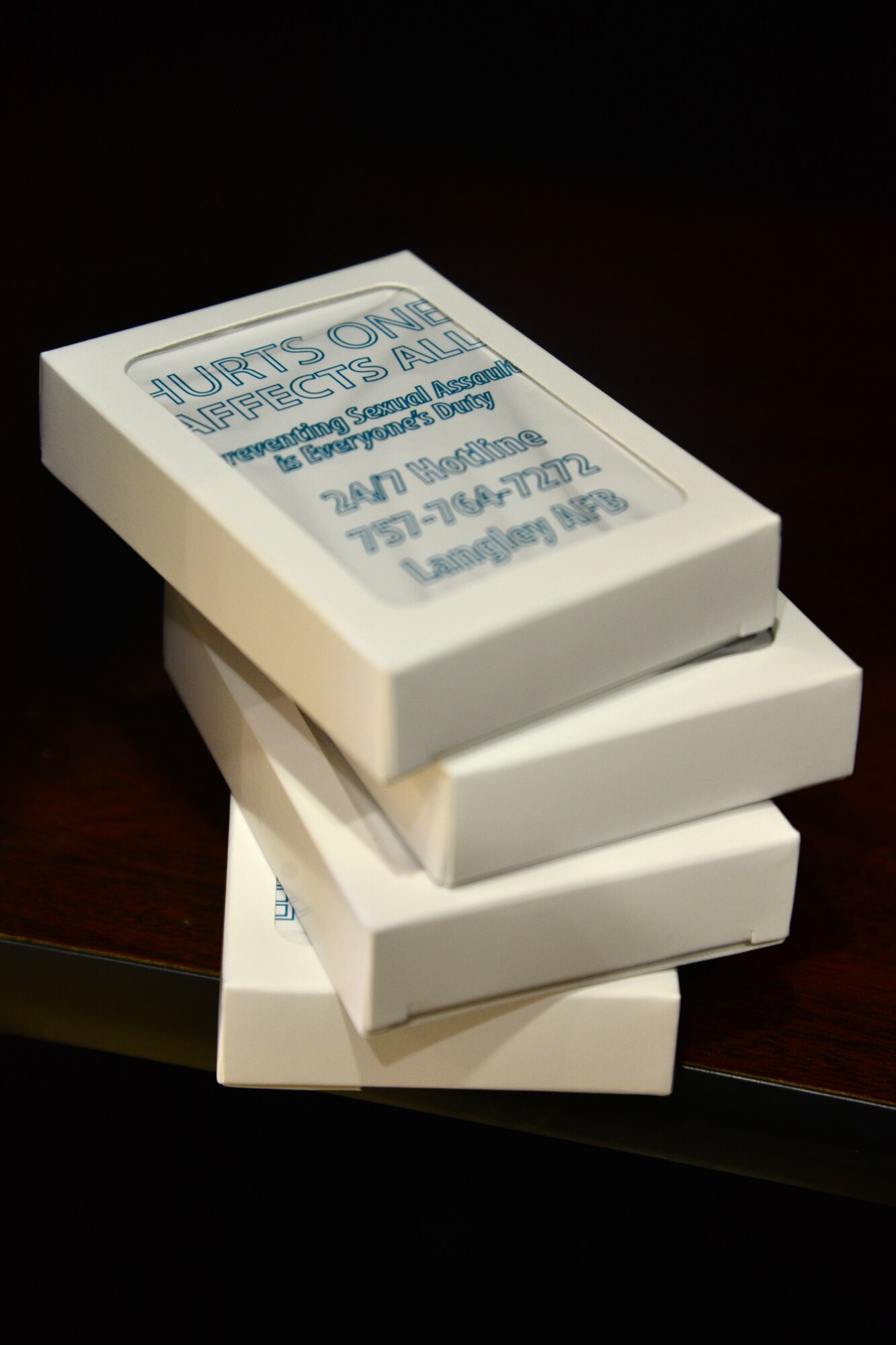 Decks of cards lay on a shelf during a “Got Consent?” mock trial at Langley Air Force Base, Nov. 21, 2014. The “Got Consent?” program was designed to promote awareness, discussion and training about ways people communicate with the opposite sex, and ultimately what happens when consent is not given for a sexual encounter. (U.S. Air Force photo by Senior Airman Aubrey White/Released)
