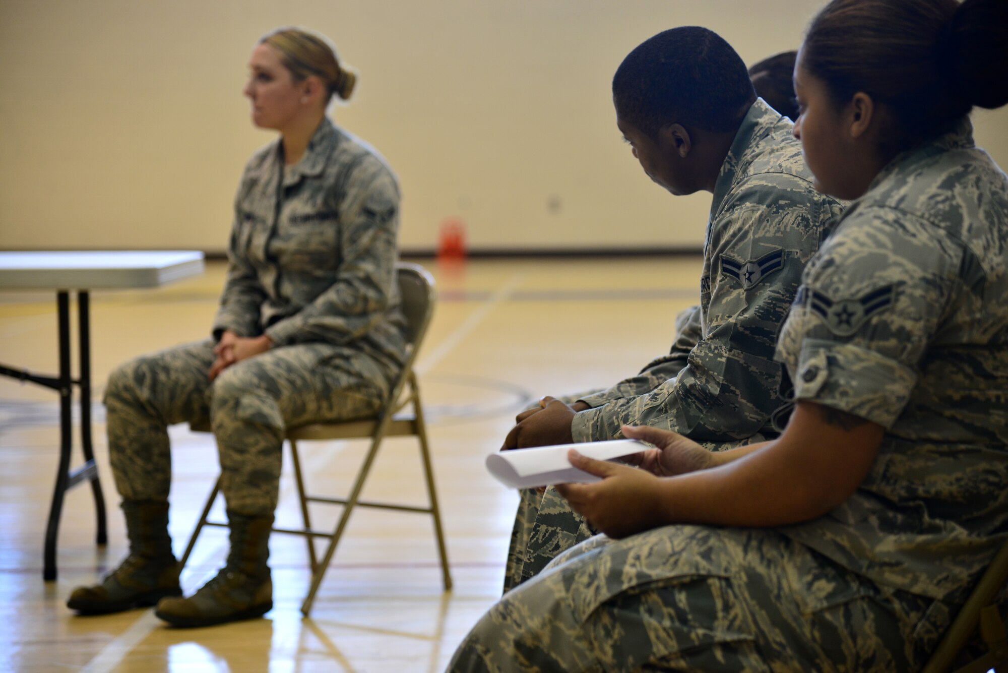 U.S. Air Force Airmen listen to Airman 1st Class Jessica Almonacid, 633rd Surgical Operations Squadron general surgery medical technician, as she reenacts a victim’s testimony during a “Got Consent?” mock trial at Langley Air Force Base, Va., Nov. 21, 2014. After hearing the victim’s and accused’s accounts of the events surrounding the alleged sexual assault, a jury of Airmen deliberated and came to a verdict. The “Got Consent?” program is intended to help Airmen better comprehend the proceedings of a sexual assault case, not necessarily to find the “right” verdict. (U.S. Air Force photo by Senior Airman Aubrey White/Released) 