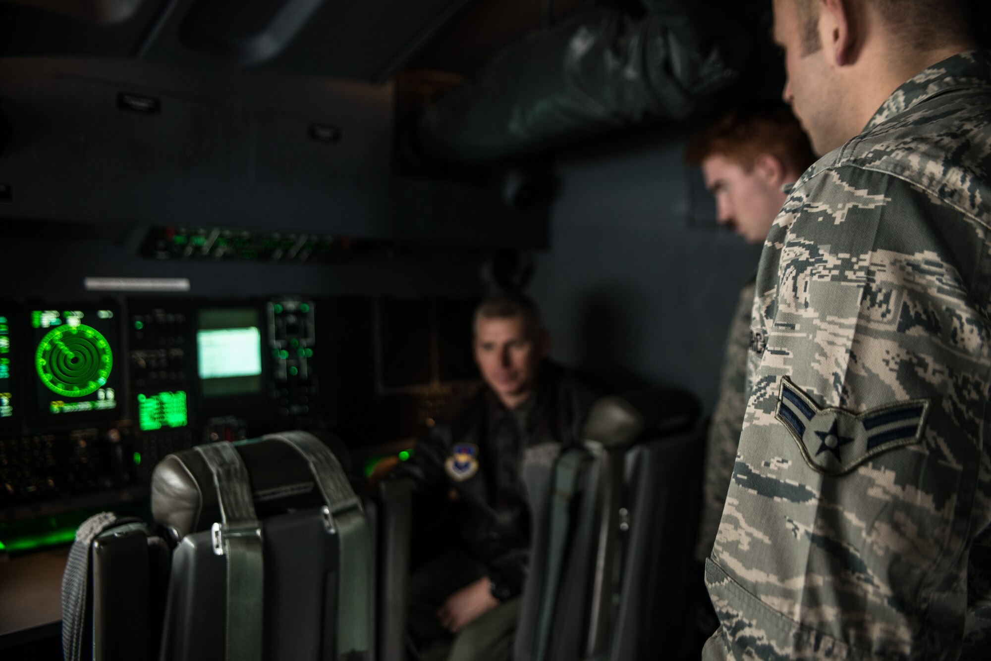 Airmen from the 336th Training Support Squadron listen to Lt. Colonel Daniel Leichssenring, 58th Operations Support Squadron, about his experiences with flying in the C-130J Super Hercules Nov. 20, 2014, at Fairchild Air Force Base, Wash. Prior to take off, Leichssenring and the C-130J crew gave Airmen a chance to walk around and ask questions about the aircraft and its newest modifications.(U.S. Air Force photo/Staff Sgt. Alexandre Montes)