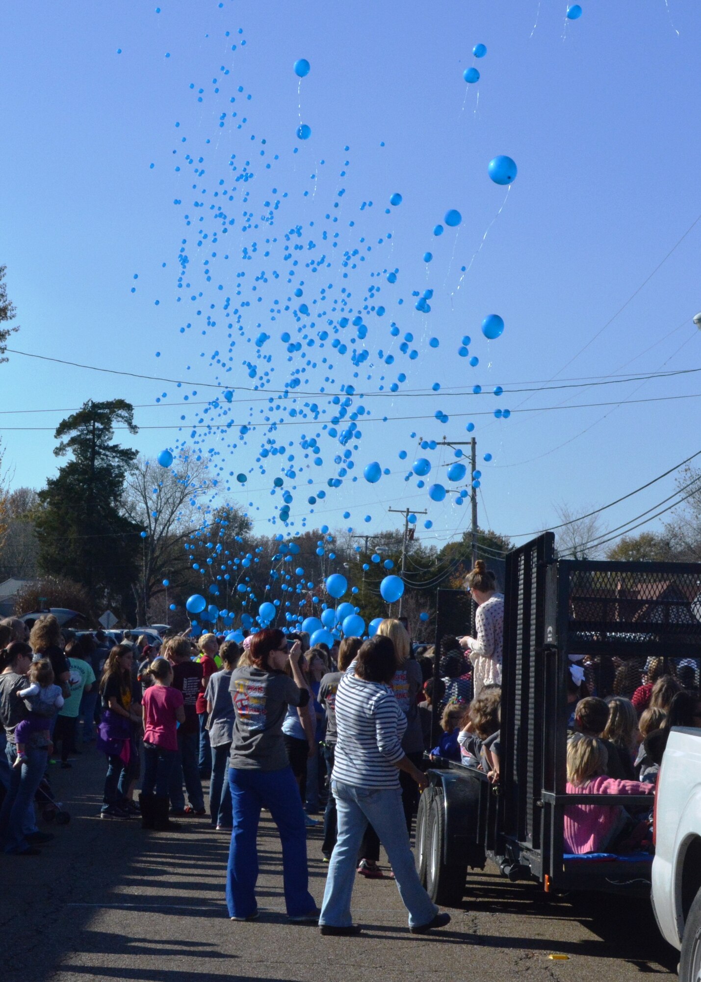 Caledonia Elementary School celebrates receiving Blue Ribbon Award
Caledonia Elementary School students and teachers release blue balloons during a parade Nov. 21 on Main Street in Caledonia, Miss., to celebrate the school’s recognition as a National Blue Ribbon School for 2014. Caledonia Elementary was recognized by U.S. Secretary of Education Arne Duncan as one of 337 schools nationwide, and the only public school in Mississippi, to receive the award. This accolade was based on their overall academic excellence and/or their progress in closing achievement gaps among student subgroups. More than 150 Columbus Air Force Base-affiliated students attend Caledonia Elementary. (U.S. Air Force photo/Tech. Sgt. Amanda Savannah)