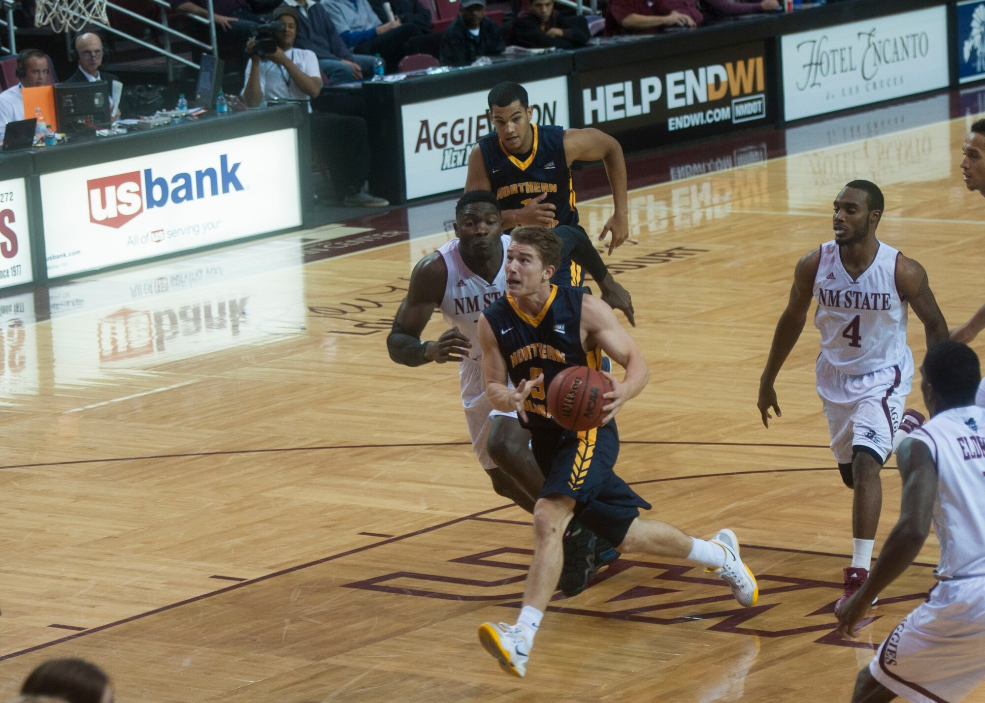 Tevin Svihovec, guard for the Northern Colorado Bears, charges towards the rim during a matchup with the New Mexico State Aggies at the Pan American Center in Las Cruces, N.M., Nov. 19. The Aggies had a rocky start to the season, dropping consecutive losses to Wichita State and St. Mary’s, but managed to get back on track after steamrolling Northern Colorado 86-65. (U.S. Air Force photo by Senior Airman Daniel E. F. Liddicoet/Released)