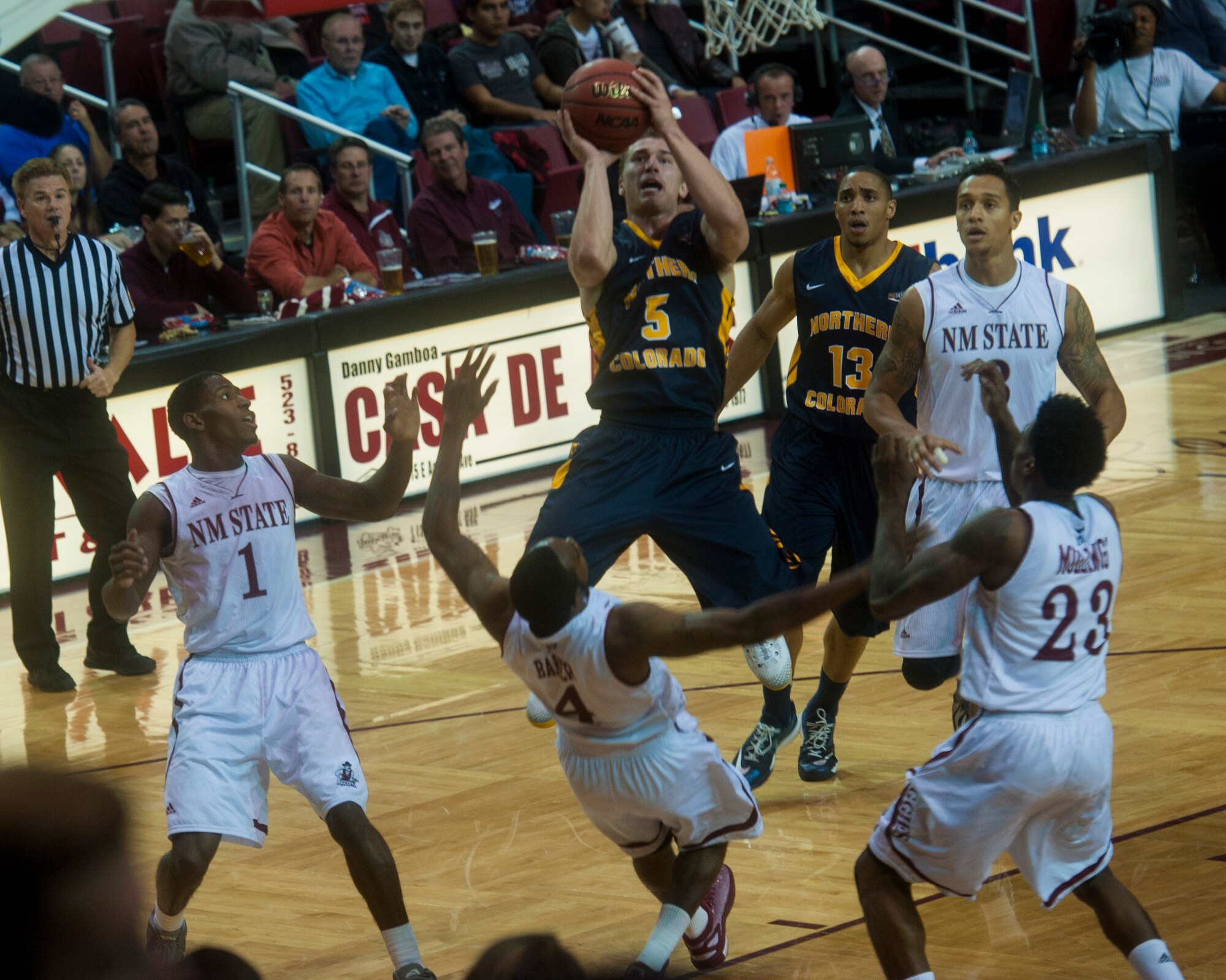 Tevin Svihovec, guard for the Northern Colorado Bears, shoots a jump shot during a matchup with the New Mexico State Aggies at the Pan American Center in Las Cruces, N.M., Nov. 19. The Aggies had a rocky start to the season, dropping consecutive losses to Wichita State and St. Mary’s, but managed to get back on track after steamrolling Northern Colorado 86-65. (U.S. Air Force photo by Senior Airman Daniel E. F. Liddicoet/Released)