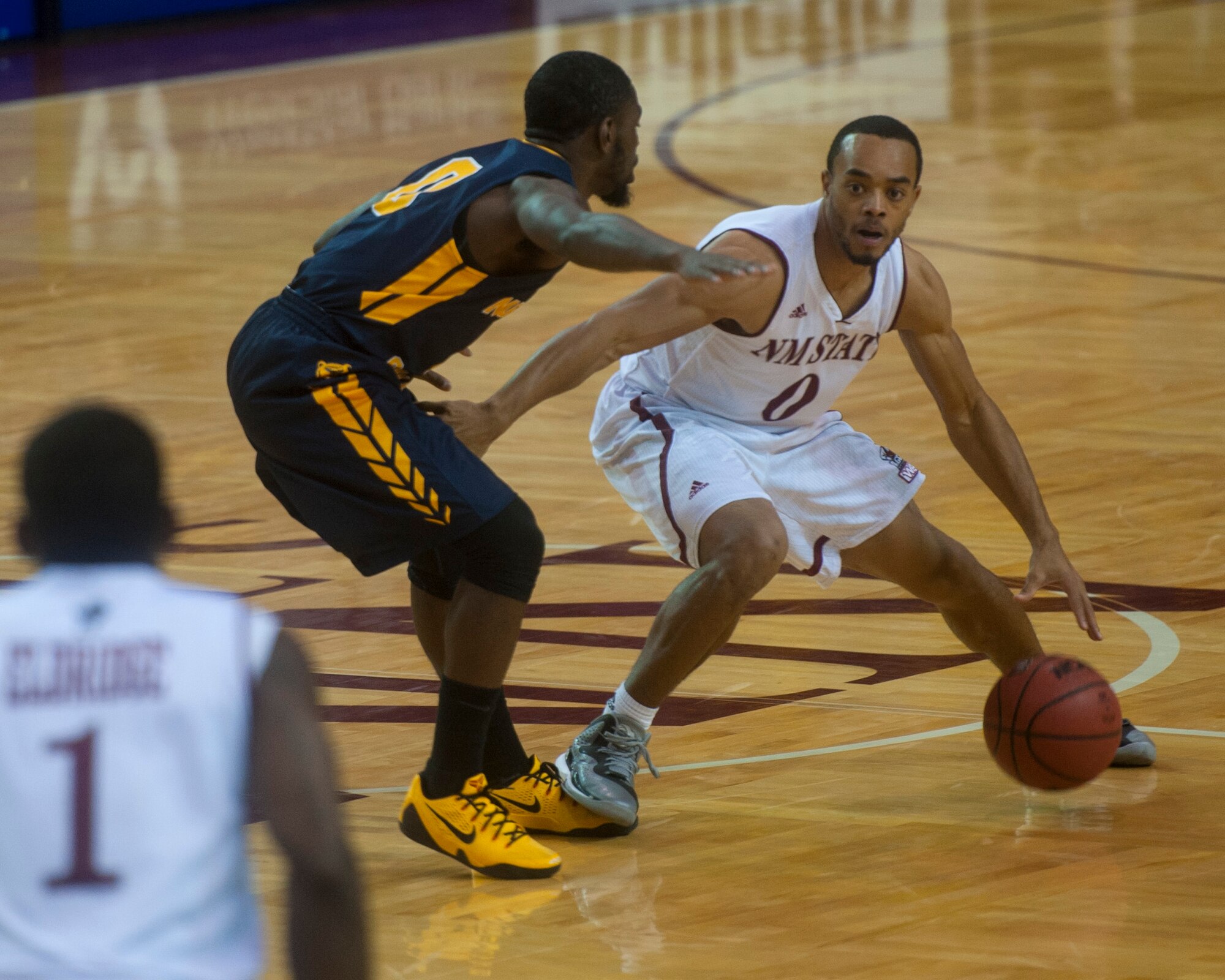 Travon Landry, guard for the New Mexico State Aggies, shoots a free throw during a matchup with Northern Colorado at the Pan American Center in Las Cruces, N.M., Nov. 19. Daniel Mullings led the Aggies posting 20 points on the night, the Aggies got ahead early in the first half and managed to go 18 for 29 in the second to completely dismantle Northern Colorado. Other NCAA basketball teams to follow in the local area include University of New Mexico and University of Texas El Paso. (U.S. Air Force photo by Senior Airman Daniel E. F. Liddicoet/Released)