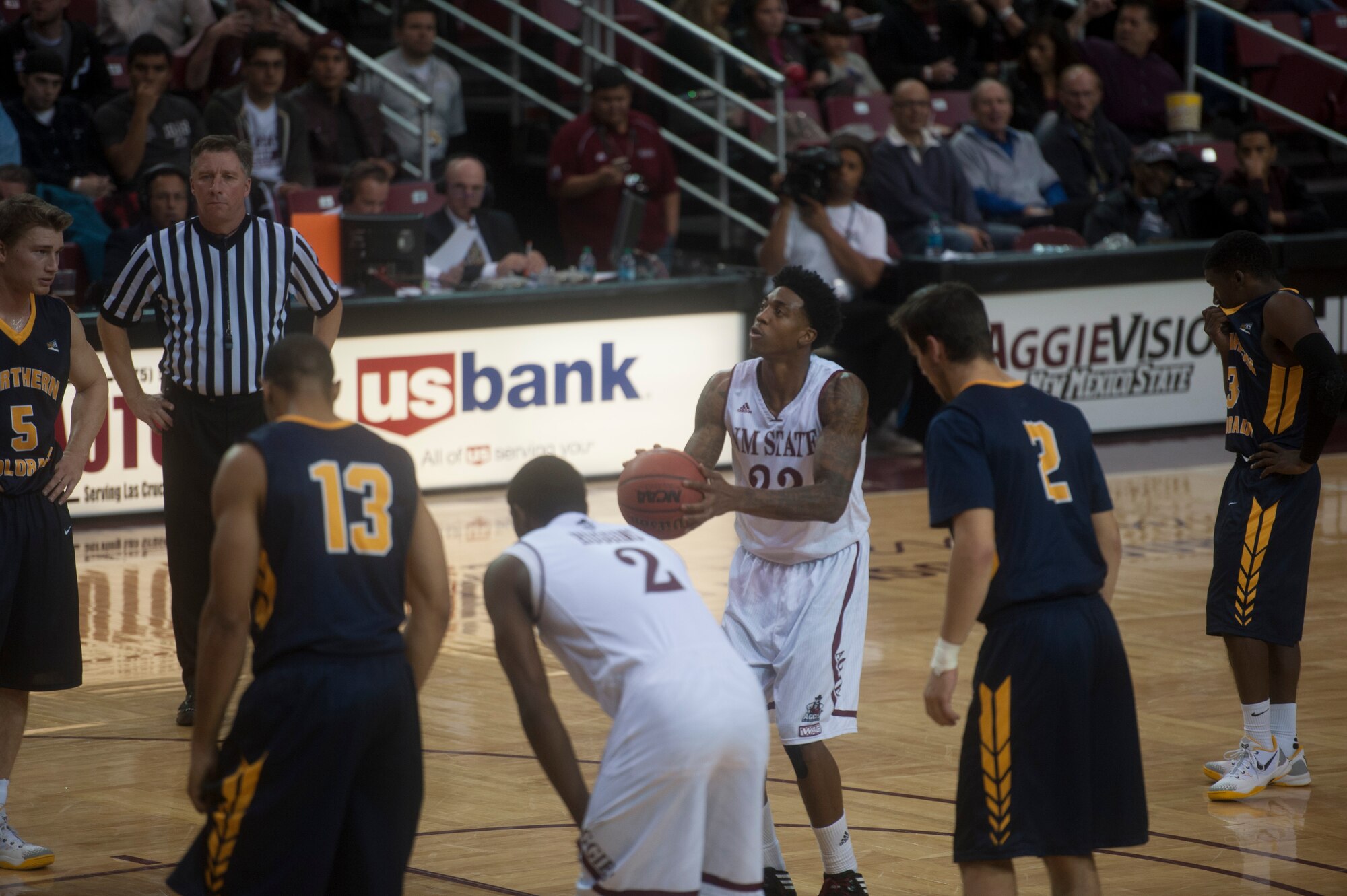 Daniel Mullings, guard for the New Mexico State Aggies, shoots a free throw during a matchup with Northern Colorado at the Pan American Center in Las Cruces, N.M., Nov. 19. Mullings led the Aggies posting 20 points on the night, the Aggies got ahead early in the first half and managed to go 18 for 29 in the second to completely dismantle Northern Colorado. Other NCAA basketball teams to follow in the local area include University of New Mexico and University of Texas El Paso. (U.S. Air Force photo by Senior Airman Daniel E. F. Liddicoet/Released)