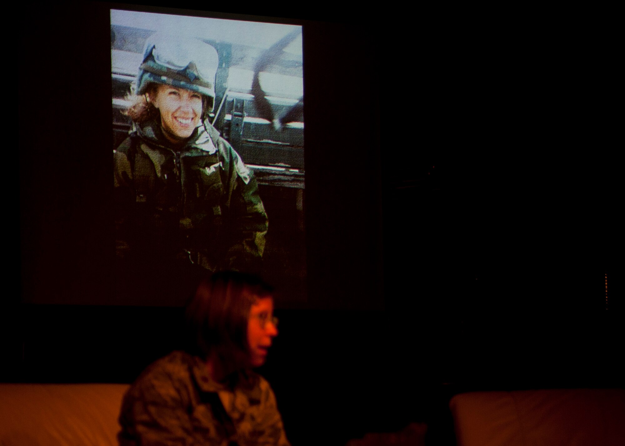 PETERSON AIR FORCE BASE, Colo. – Maj. Wendy Kaegy, 21st Medical Group health care integrator, tells her story of sexual abuse before and during her military career during Storytellers at the Club, Nov. 21, 2014. Storytellers is a live event where fellow Airmen share their stories of resilience, motivation and professional pride in a relaxing environment that allows the audience to connect and learn. (Air Force photo by Senior Airman Tiffany DeNault)