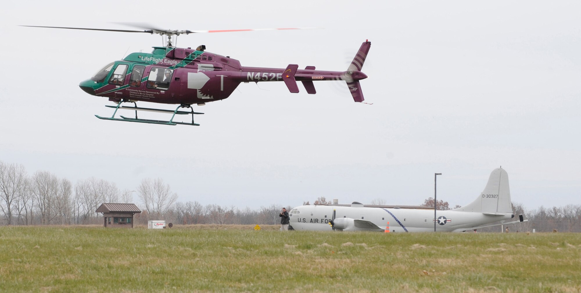 WHITEMAN AIR FORCE BASE, MO—Life Flight Eagle Helicopter lands at Whiteman Air Force Base, Mo., Nov. 21, 2014 for a motor vehicle accident training exercise.  The purpose of the training was to improve response time and treatment for victims, as well as coordinate patient transport with community partners. The 509th Medical Group, 509th CES Firefighters, Johnson County Ambulance District, and Life Flight participated in the exercise. (U.S. Air Force photo by Staff Sgt. Alexandra M. Boutte/Released)