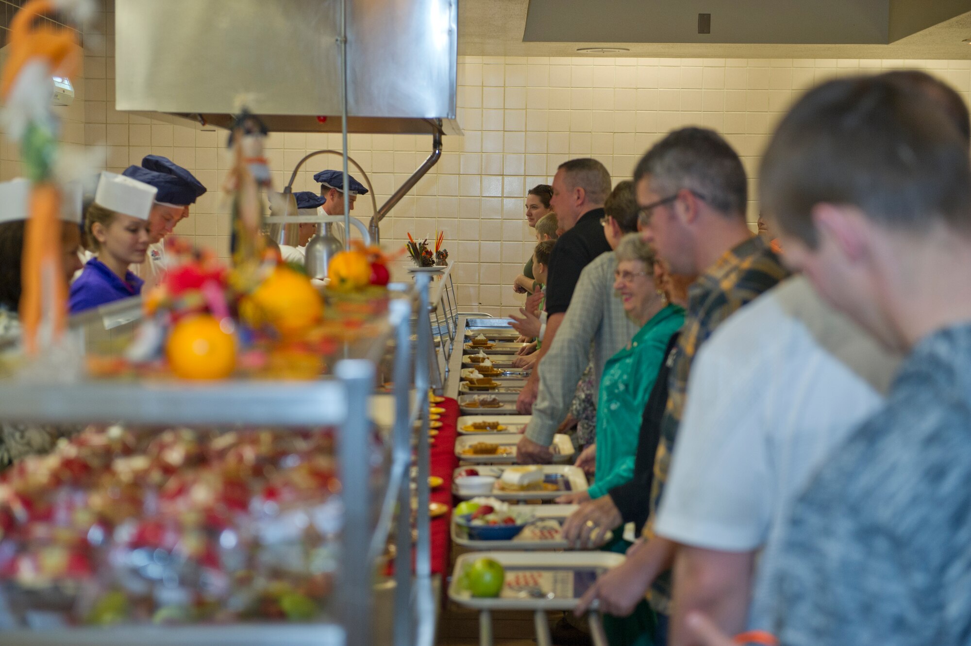 Members of Team Holloman gather at the Shifting Sands Dining Facility to enjoy a Thanksgiving meal at Holloman Air Force Base, N.M., Nov. 27. The 49th Wing Force Support Squadrons have worked along with senior leadership from around base to ensure this annual event is open to all Airmen who may not be able to enjoy Thanksgiving with their families. (U.S. Air Force Photo by Airman 1st Class Chase Cannon/Released)