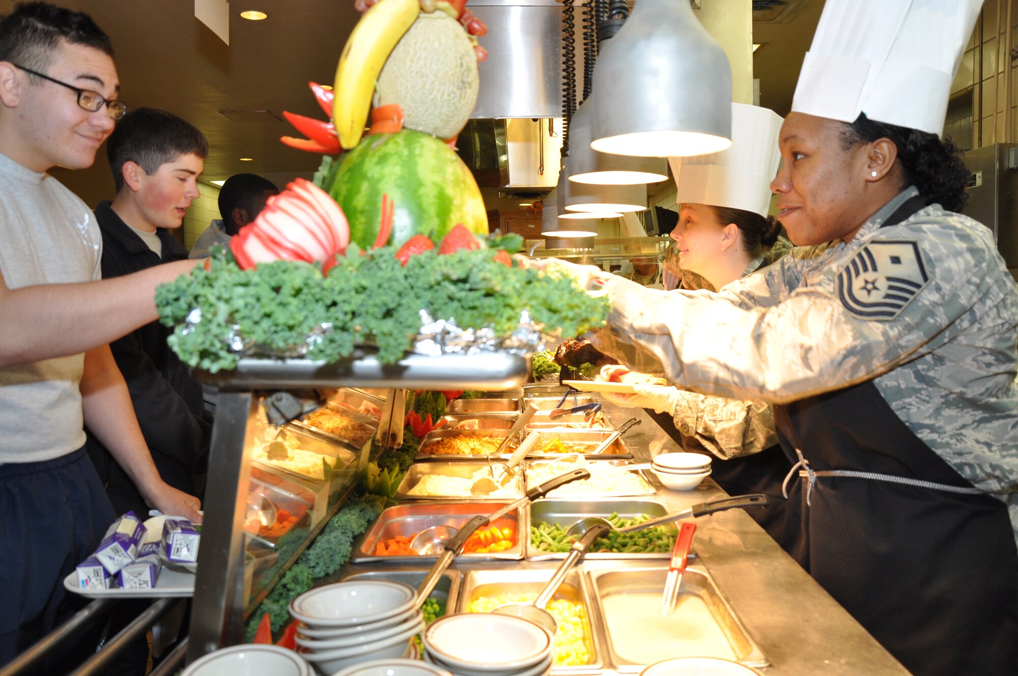 GOODFELLOW AIR FORCE BASE, Texas – Base leadership serves service members for Thanksgiving at the Western Winds Dining Facility Nov. 27. The leadership-served Thanksgiving meal is an annual tradition held across bases everywhere in an effort to boost morale for those who cannot spend the day with their families. (U.S. Air Force photo/ Senior Airman Joshua Edwards)
