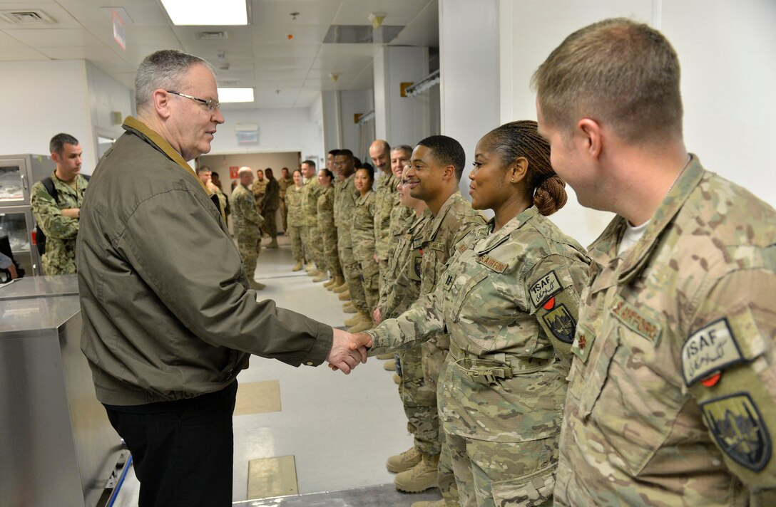 Deputy Defense Secretary Bob Work  makes his way down a line of nurses and medical staff as he thanks them for their service at Craig Joint Theater Hospital on Bagram Air Base, Afghanistan, Nov. 27, 2014. Work traveled to Afghanistan to spend Thanksgiving with the troops and share the department's gratitude with them. DoD photo by Glenn Fawcett 