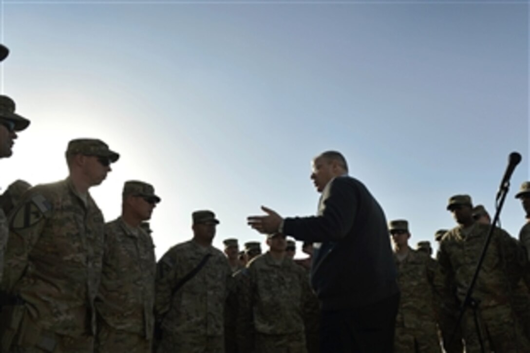 U.S. Deputy Defense Secretary Bob Work engages with troops at the Train, Advise and Assist Command South headquarters on Kandahar Airfield, Afghanistan, Nov. 28, 2014. Work traveled to Afghanistan to personally thank deployed troops on Thanksgiving for their service and sacrifice this holiday season.