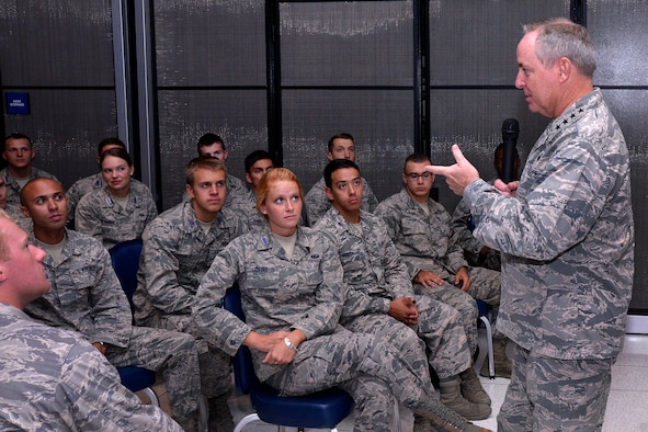 Air Force Chief of Staff Gen. Mark A. Welsh III speaks to cadets Sept. 29, 2014, during his weeklong visit to the U.S. Air Force Academy, Colo. Welsh told the cadets that today's Cadet Wing owes its success to the achievements of previous cadets and Academy graduates. Welsh challenged the cadets to build upon the Academy's legacy once they graduate. (U.S. Air Force photo/Jason Gutierrez)