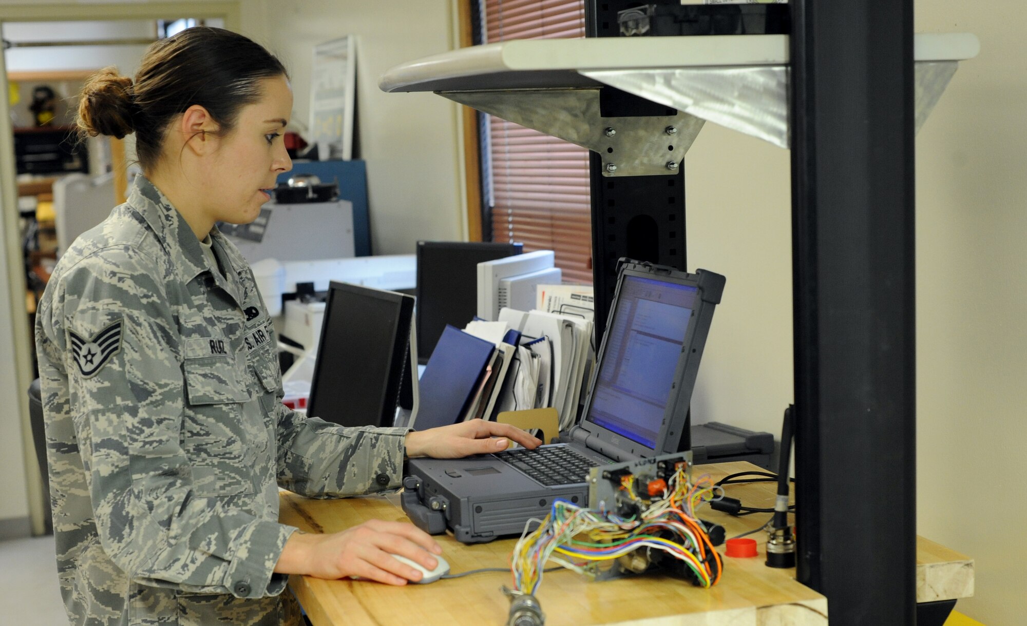 Staff Sgt. Aimee Ruiz tests the resistance and voltage in a B-1B Lancer circuit panel at Dyess Air Force Base, Texas. Ruiz is an Eclypse programmer with 7th Maintenance Group. The Eclypse program is still in development, but if approved, could be used throughout the entire U.S. Air Force’s B-1B program to test and evaluate malfunctioning circuit cards. (U.S. Air Force photo by 2nd Lt. Lauren Linscott)