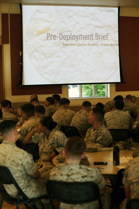 Marines and Sailors with the 24th Marine Expeditionary Unit listen to a pre-deployment brief at (Major General John?) Marston Pavilion aboard Camp Lejeune, N.C., Sept. 30, 2014. Service members received classes and instructions regarding personal belongings and family affairs in preparation of the deployment at the end of the year.