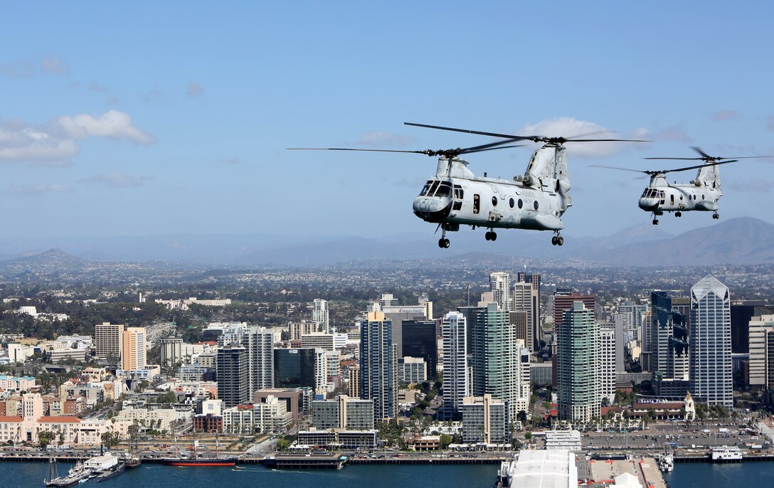 U.S. Marines with Marine Medium Helicopter Squadron (HMM) 364, Marine Aircraft Group 39, 3rd Marine Aircraft Wing (MAW), fly CH-46E Sea Knight helicopters over San Diego, Calif., March 31, 2014. After 47 years of flying the CH-46, HMM-364, “Flies the Barn”, taking off and landing in unison and flying in mass formations, signifying the transition to the MV-22 Osprey. (U.S. Marine Corps photo by Sgt. Keonaona C. Paulo, 3rd MAW Combat Camera/Released)