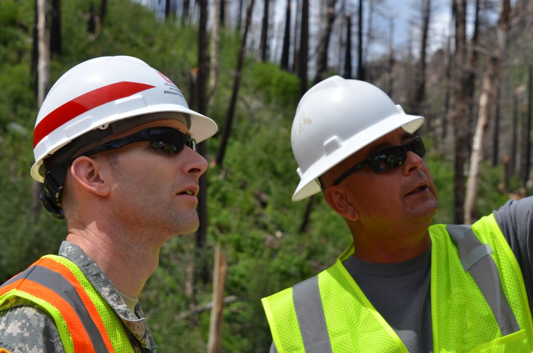 Lt. Col. Patrick Dagon, commander, Albuquerque District, views the burned area at Santa Clara with Matt Tafoya, forestry director, Santa Clara Pueblo.