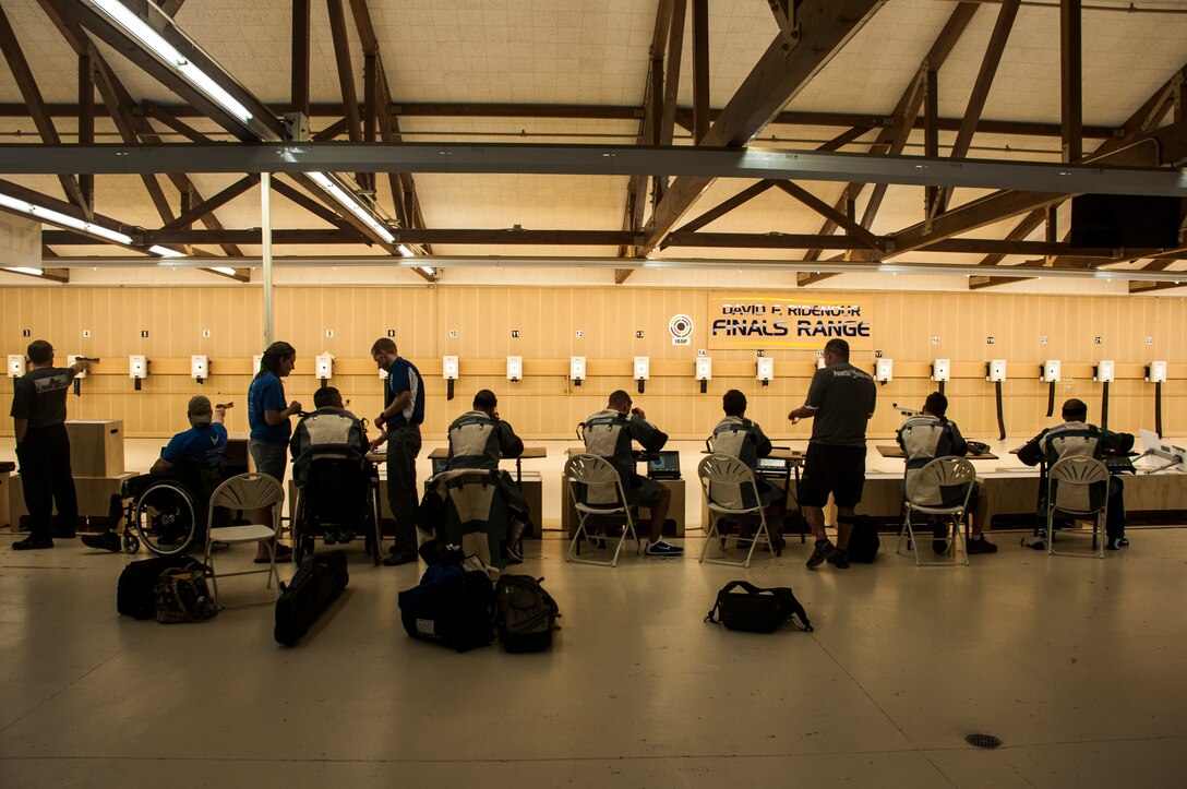 The Air Force Wounded Warrior shooting team practices Sept. 26, 2014, at the U.S. Olympic Training Center in Colorado Springs, Colo., before the 2014 Warrior Games. The games feature more than 200 wounded, ill, and injured service members and veterans participating in seven sports including archery, cycling, shooting, sitting-volleyball, swimming, track and field and wheelchair basketball. (U.S. Air Force photo/Staff Sgt. Julius Delos Reyes)